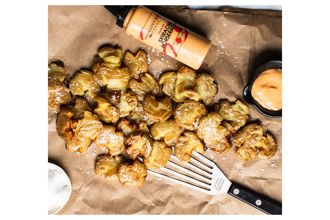 Sriracha Horseradish Crispy Smashed Potatoes with Terrapin Ridge Farms Sriracha Horseradish sauce Sriracha Horseradish Crispy Smashed Potatoes with Terrapin Ridge Farms Sriracha Horseradish sauce